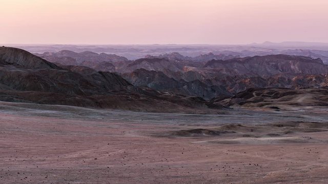 Panorama on barren valleys and canyons, known as "moon landscape", Namib desert, Namib Naukluft National Park, travel destination in Namibia, Africa.