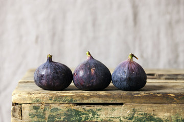 Fresh figs on wooden board