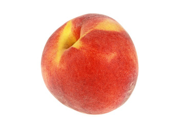 Single peach fruit isolated on a white background