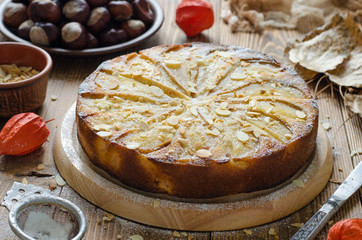 Pie with pear vegetarian with almond petals
