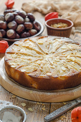 Pie with pear vegetarian with almond petals
