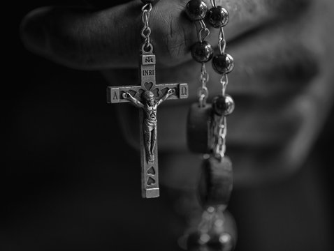 Hand Holding Rosary