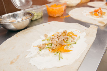 Chef prepares shaurma doner, concept restaurant fast food