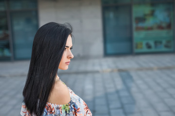 brunette girl in the street