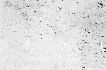 Wall fragment with scratches and cracks