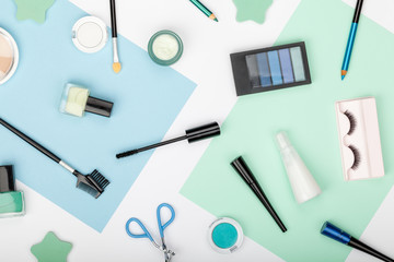 set of professional decorative cosmetics, makeup tools and accessory on white background. beauty, fashion, party and shopping concept. trendy flat lay composition, top view