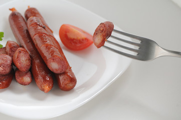Sausages on a white background