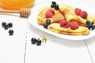 Pancake - Crepes with berries and honey