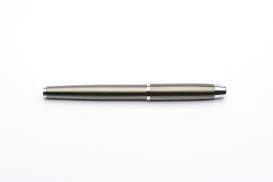 Elegant chrome ballpoint pen isolated on white background