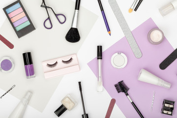 set of professional decorative cosmetics, makeup tools and accessory on white background. beauty, fashion, party and shopping concept. trendy flat lay composition, top view