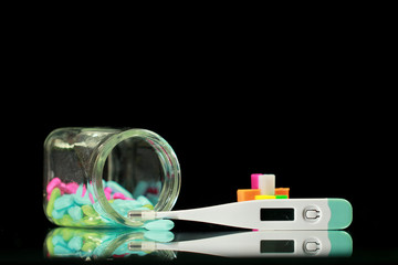 Thermometer and pills