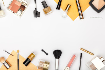 set of professional decorative cosmetics, makeup tools and accessory on white background with copy space for text. beauty, fashion, party and shopping concept. flat lay frame composition, top view
