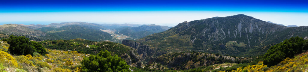 Fototapeta na wymiar Horizontal wide panorama of Crete valley landscape background