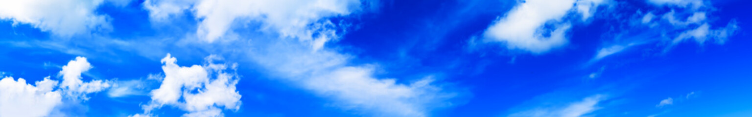 Horizontal wide high altitude dramatic blue loudscape panorama b