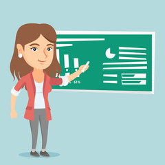 Young caucasian teacher or student standing in front of the blackboard with a piece of chalk in hand. Teacher writing on the blackboard with chalk. Vector cartoon illustration. Square layout.