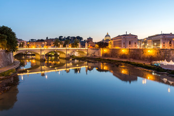 Obraz premium Amazing Sunset view of Tiber River and St. Peter's Basilica in Rome, Italy