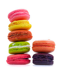 Pink macaroons cookies tower isolated on white background