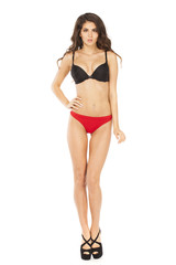 Full length portrait of young woman wearing sexy underwear