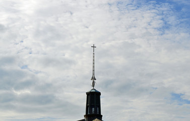 Fototapeta na wymiar Christian background photo of a church steeple with a cross