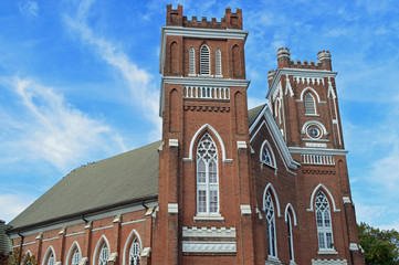 Christian photo of an historic church in the downtown area of a city