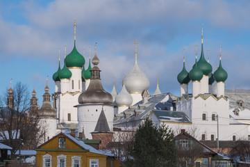 Fototapeta na wymiar The Russian city of Rostov the Great on a winter day. Domes of temples and towers of the Kremlin