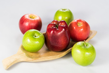 Assorted Apples on Wooden Plate