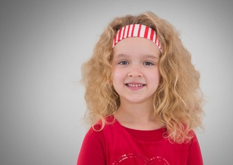 Girl against grey background with hairband