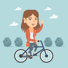 Fototapeta premium Caucasian sportive woman riding a bicycle in the park. Cyclist riding bicycle and waving hand. Young woman on a bicycle outdoors. Healthy lifestyle concept. Vector cartoon illustration. Square layout.