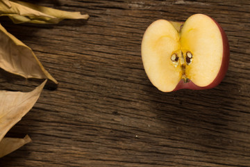 apple on old wooden. morning