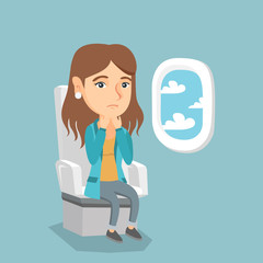 Young caucasian woman shocked by plane flight in the turbulent area. Frightened airplane passenger sitting in airplane seat and suffering from aerophobia. Vector cartoon illustration. Square layout.