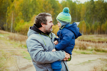 Father and son look each other eye to eye