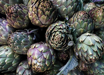 Artichokes on farmers market in the south of Mediterranean, top view