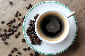 cup of espresso coffee on wooden table
