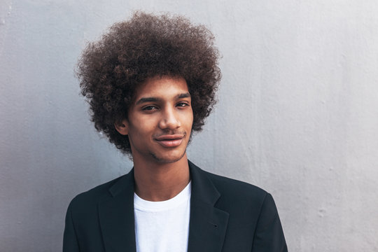 Portrait of a young afro black man smiling.