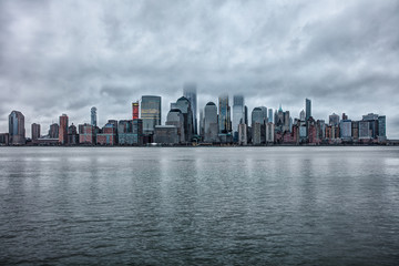 Naklejka premium Foggy skyline. Sunrise. NYC. 1WTC. Freedom Tower. Fog