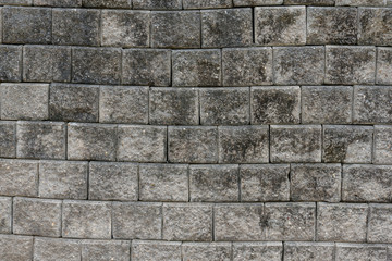 Old grungy gray brick wall texture