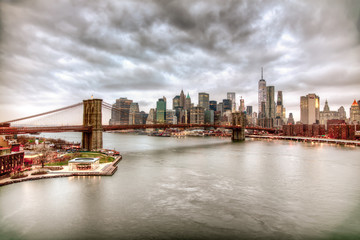 Fototapeta na wymiar NYC Skyline and Brooklyn Bridge + Carousel