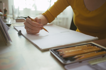 Girl drawing architecture