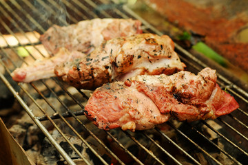 medium roasted pork on iron grill.Thailand local tradition grill pork 