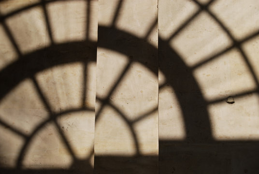 Concret Wall  and diagonal shadows from glass window