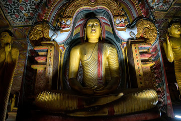 Buddha staue in cave temple in Dambulla