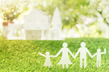 Family and house on green grass background,paper family concept. - 177872144