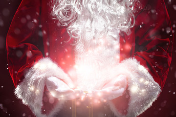 Santa Claus with magic lights