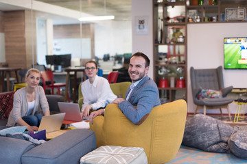 Startup Business Team At A Meeting at modern office building