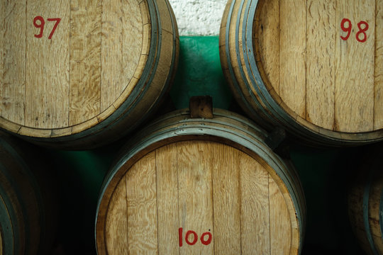 Three wine barrels with numbers