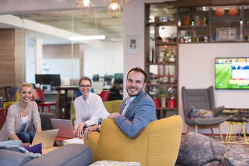 Startup Business Team At A Meeting at modern office building