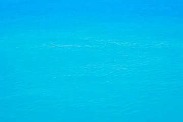 Fototapeta na wymiar blue sea water texture fresh summer nature background