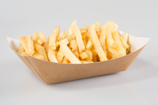 French Fries In Carton In Kraft Blank Paper Fry Box On White Background Isolated