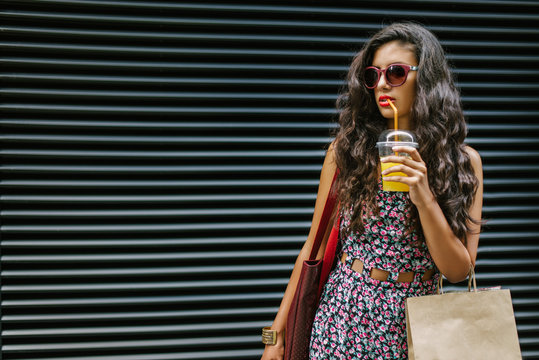 Young Stylish Woman In Shopping