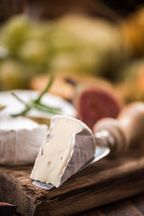 Close view on camemberd cheese slice
